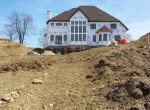 Site work around a large newly built home - 3 Brothers Excavating